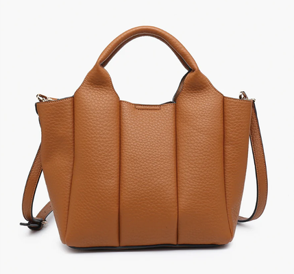 Functional backpack Bag made of vegan leather with secure top zip closure inside zip pocket two slip pockets and long adjustable strap for everyday